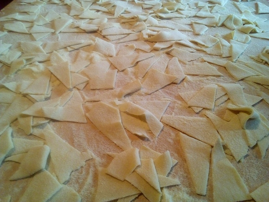 Fresh handmade pasta, cut and floured on the counter