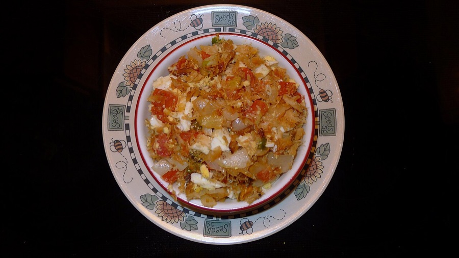 Saltfish sauteed down with tomatoes and onion